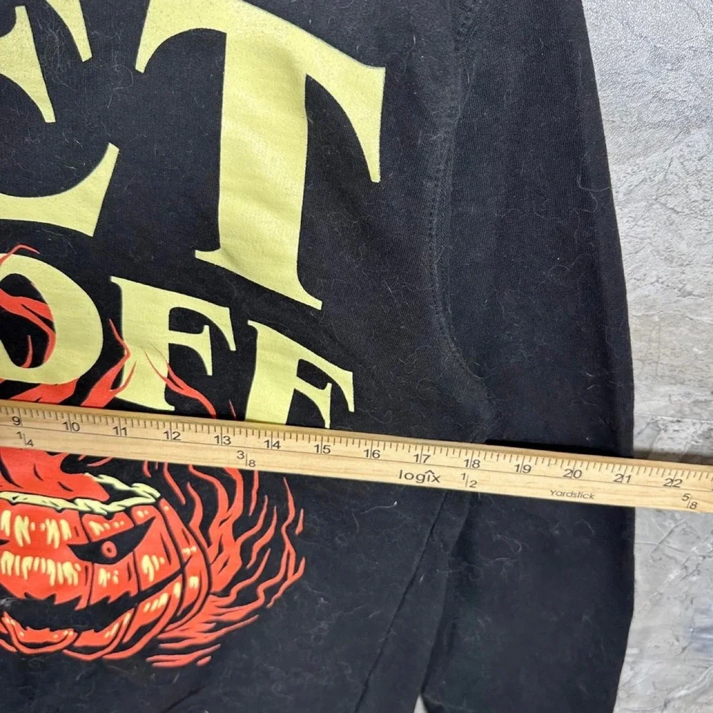 Black crewneck sweatshirt with yellow SET IT OFF flaming jack-o'-lantern size S